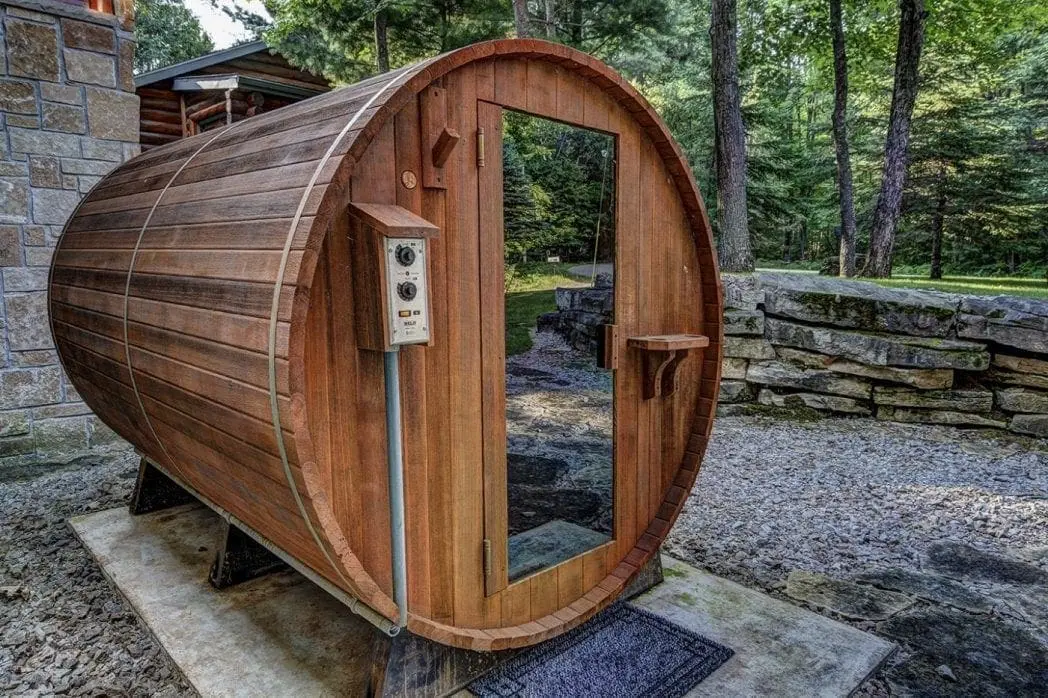 Outdoor Sauna with Natural Weathered Edge Limestone Outcropping Retaining Wall