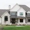 Home exterior featuring Quarry Mill's Empire Split Face Limestone with a white mortar joint.