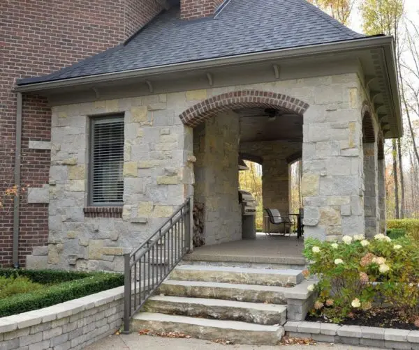 Side Patio Entrance with Charcoal Bluff Limestone Veneer