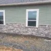 Exterior thin ledgestone masonry application