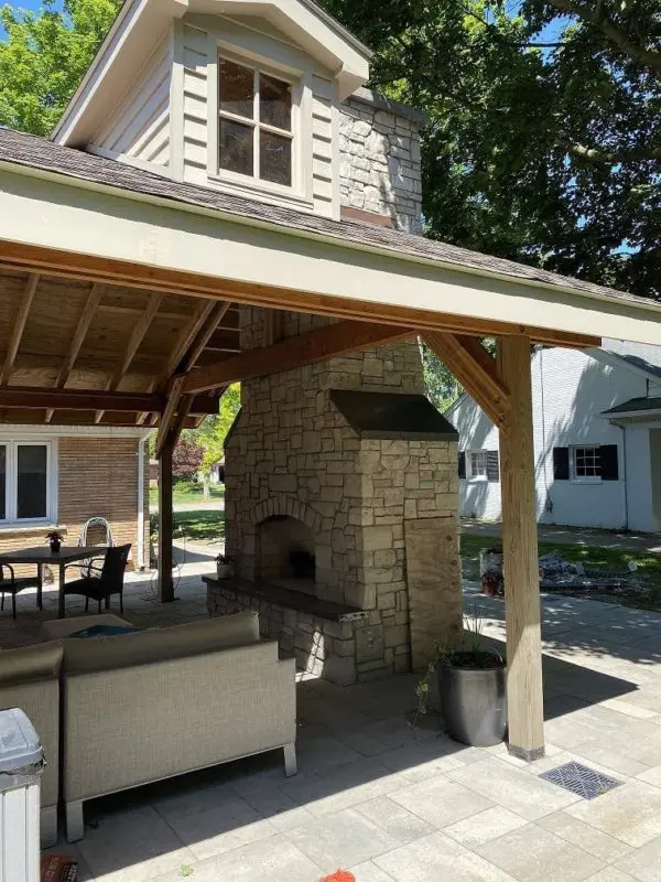 Covered Patio with Stonegate Natural Stone Veneer Fireplace