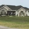 Ranch Style Home Exterior with Edmonton Custom Light Real Stone Veneer