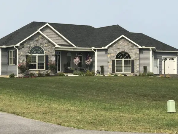 Ranch Style Home Exterior with Edmonton Custom Light Real Stone Veneer