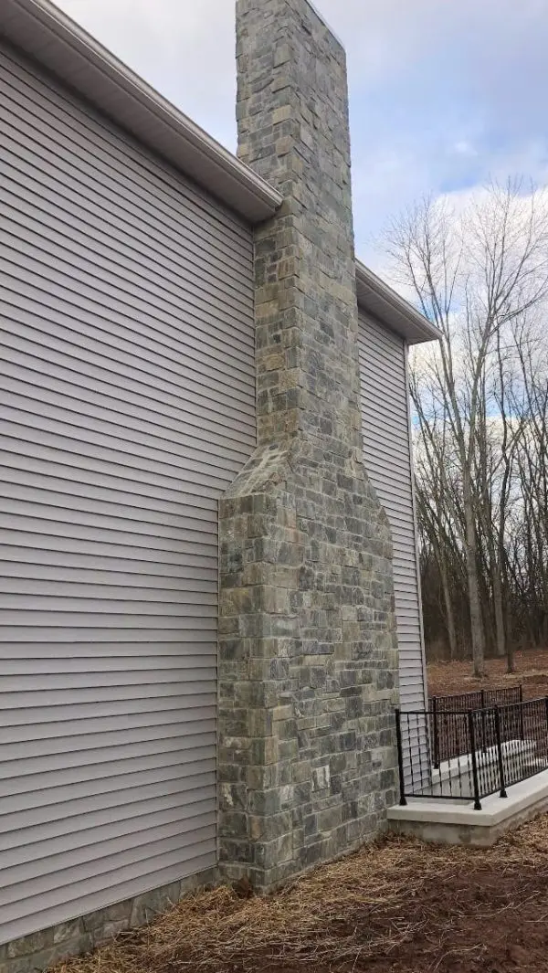 Chimney with Emerald Bay Natural Stone Veneer