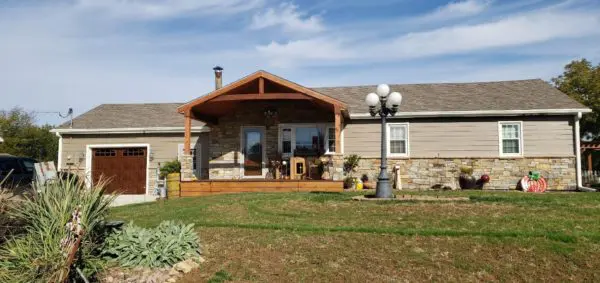 Ranch Style Home Wainscoting and Front Porch with Savannah Natural Stone Veneer