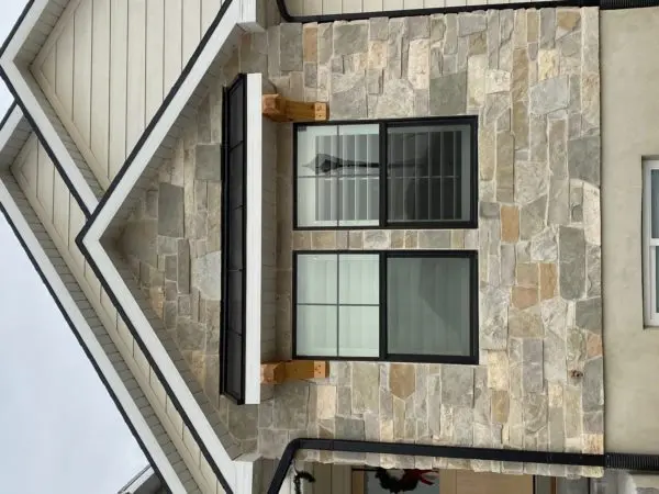 Exterior Accent Wall with Roanoke Custom Dark Real Stone Veneer