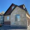 Home Exterior with Sherman Natural Stone Veneer