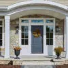 Chamberlain real thin stone veneer front entrance with tan mortar