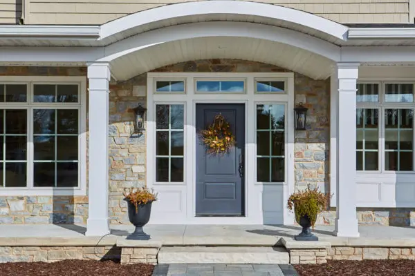 Chamberlain real thin stone veneer front entrance with tan mortar