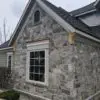 Home exterior with Olympia natural stone veneer