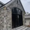 Home with Olympia real thin stone veneer exterior siding