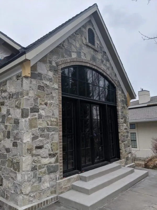 Home with Olympia real thin stone veneer exterior siding