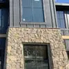 Home exterior with Pinedale real thin stone veneer drystack installation