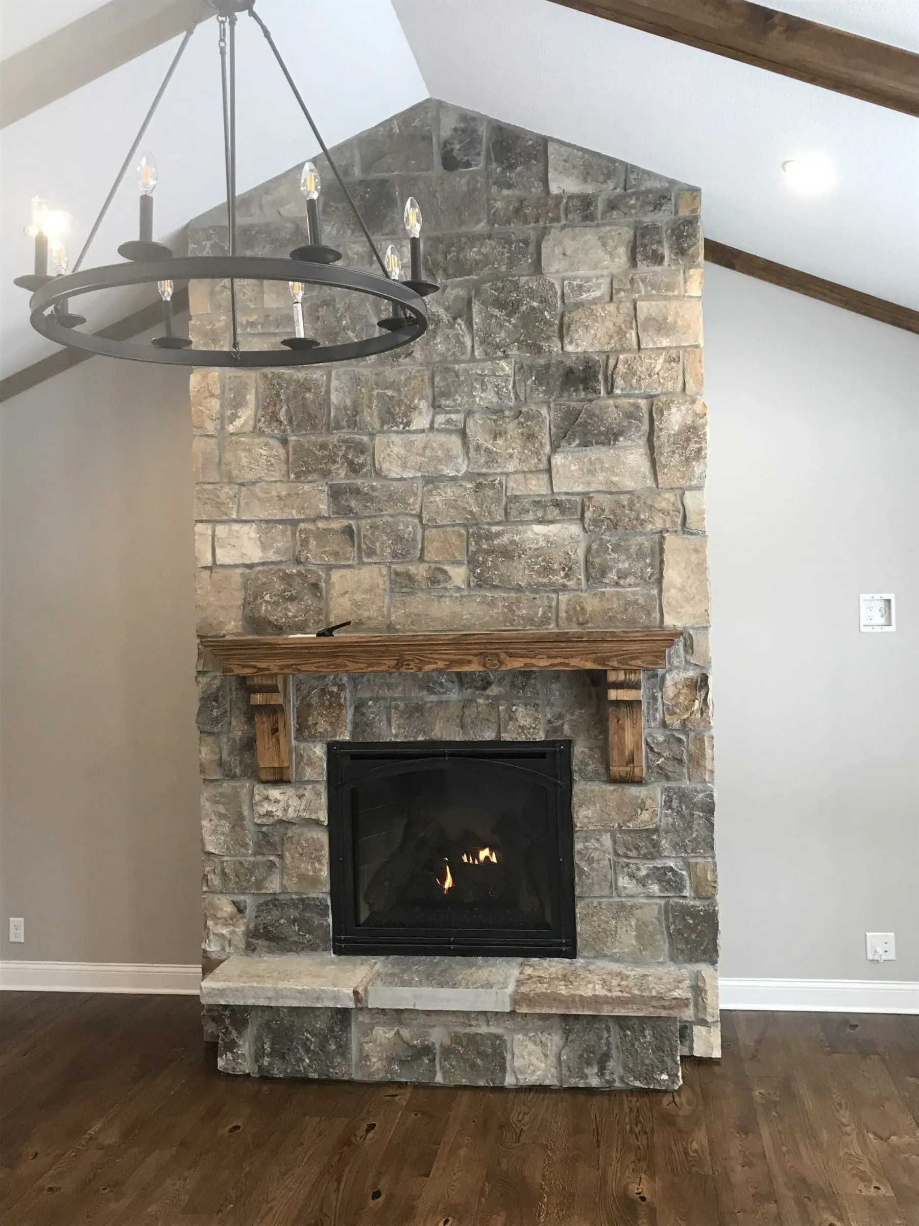Interior gas fireplace with Whistler natural stone veneer
