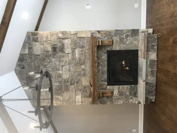 Interior gas fireplace with Whistler natural stone veneer