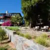 California backyard with Bonavista mosaic stone retaining wall and patio