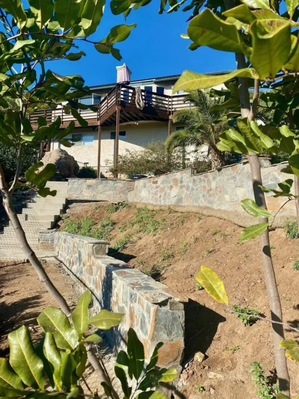 Irregular colorful stone used on a retaining wall