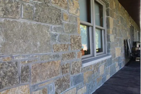 Front porch accent wall with Castle Ridge and Baltic Hills natural stone veneer