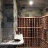 Wine Cellar with Charleston natural thin stone veneer walls