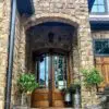 Front entrance with Dakota ashlar natural thin stone veneer with tan mortar