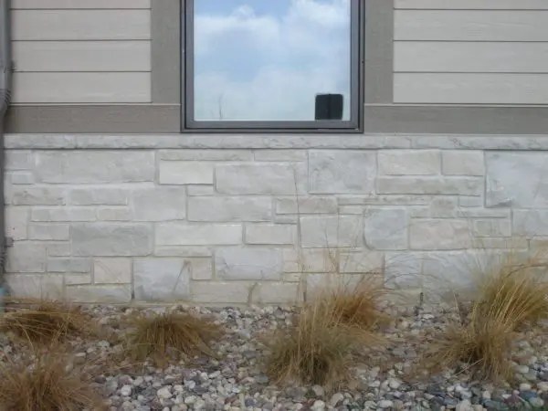 Close-up commercial wainscoting with Empire real stone veneer