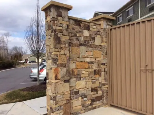 Commercial trash privacy wall with Hillsborough ashlar style natural thin stone veneer