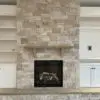 Interior gas fireplace with Primavera dimensional ledgestone real thin veneer