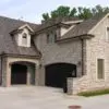 Garage with Promenade ashlar style real stone veneeer