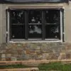 Wainscoting installation with Rochester natural stone veneer