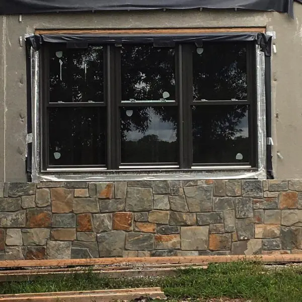 Wainscoting installation with Rochester natural stone veneer