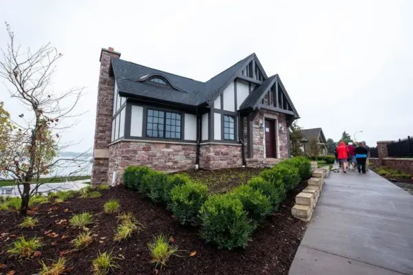 Lakehouse with Cherrywood natural thin stone veneer exterior