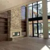 Interior floor to ceiling fireplace with Door County Ledge natural stone veneer