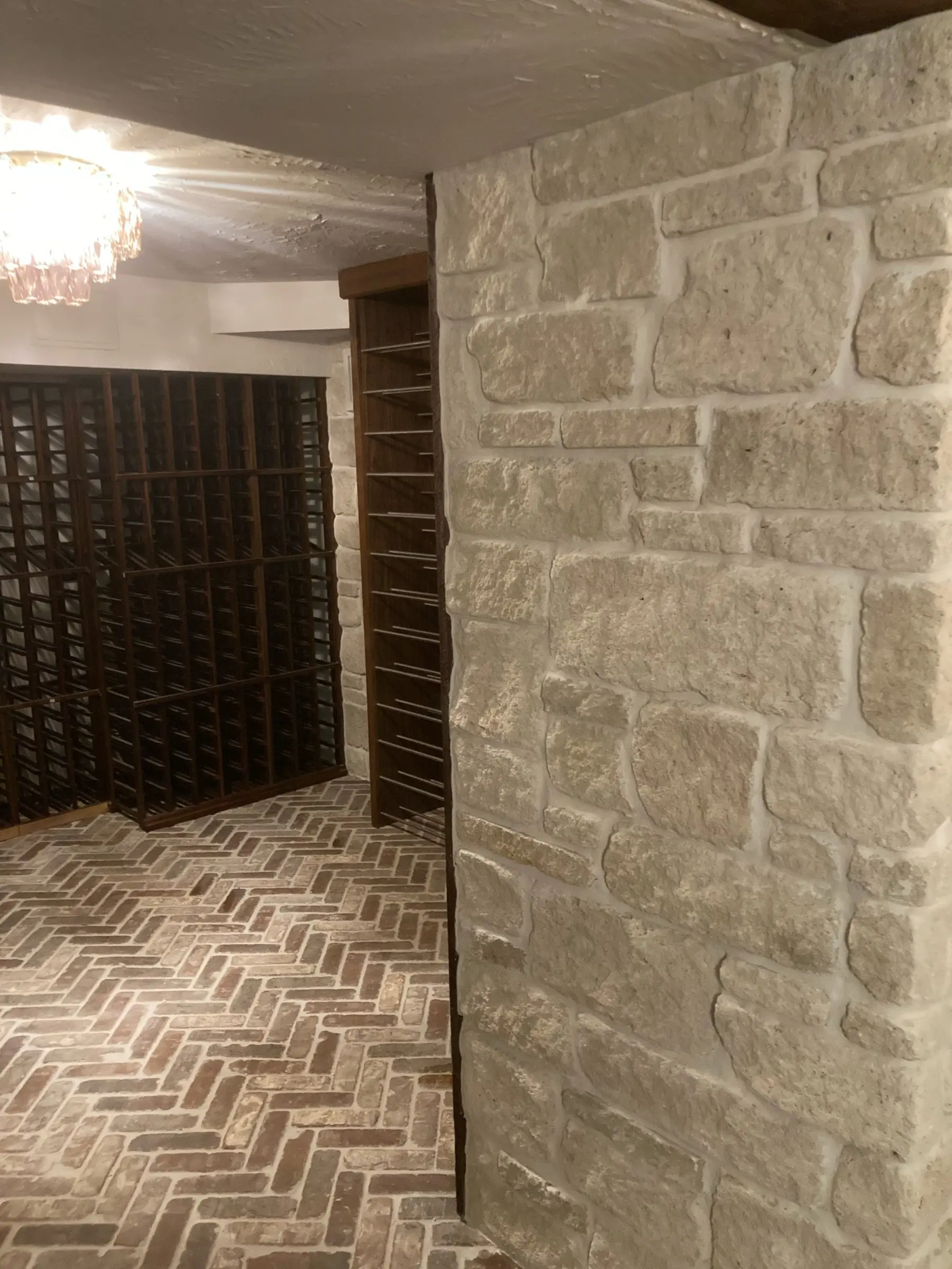 Interior Wine Cellar with La Spezia tumbled real stone veneer