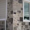 Close up exterior with custom blend of Wyndemere and Malheur real thin stone veneer