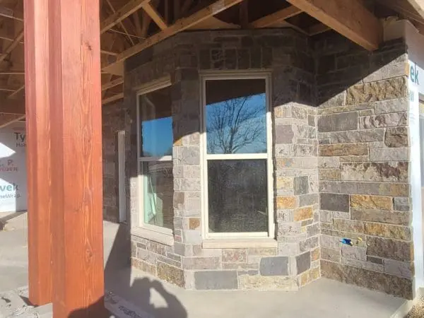 Custom Buckingham Natural Stone Veneer with Brown Patio