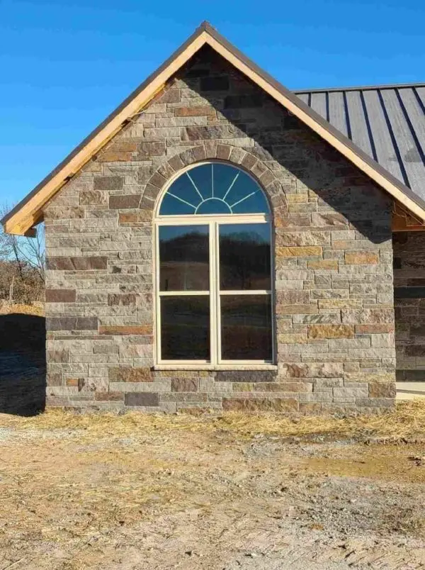 Custom Buckingham Real Stone Veneer with Brown Exterior