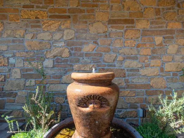 Cabernet Natural Stone Veneer Exterior Siding and Fountain