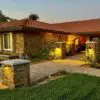 Cabernet Natural Thin Stone Veneer Home Exterior at Twilight