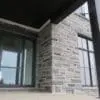 Pembroke Natural Stone Veneer Front Entrance with Light Mortar Flush Joint