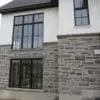 Pembroke Natural Stone Veneer Installation with Light Mortar Flush Joint