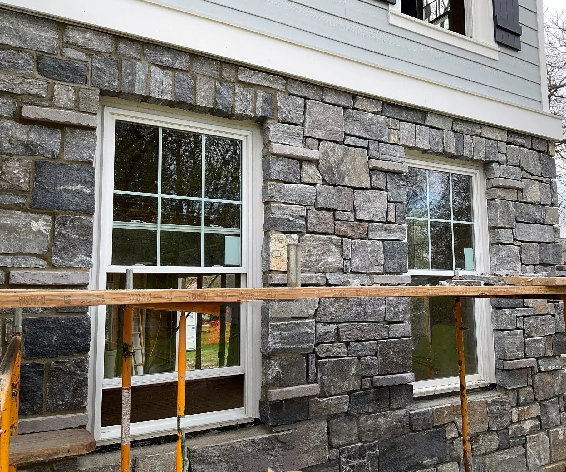 Monroe Real Thin Stone Veneer Exterior with Custom Dark Pieces