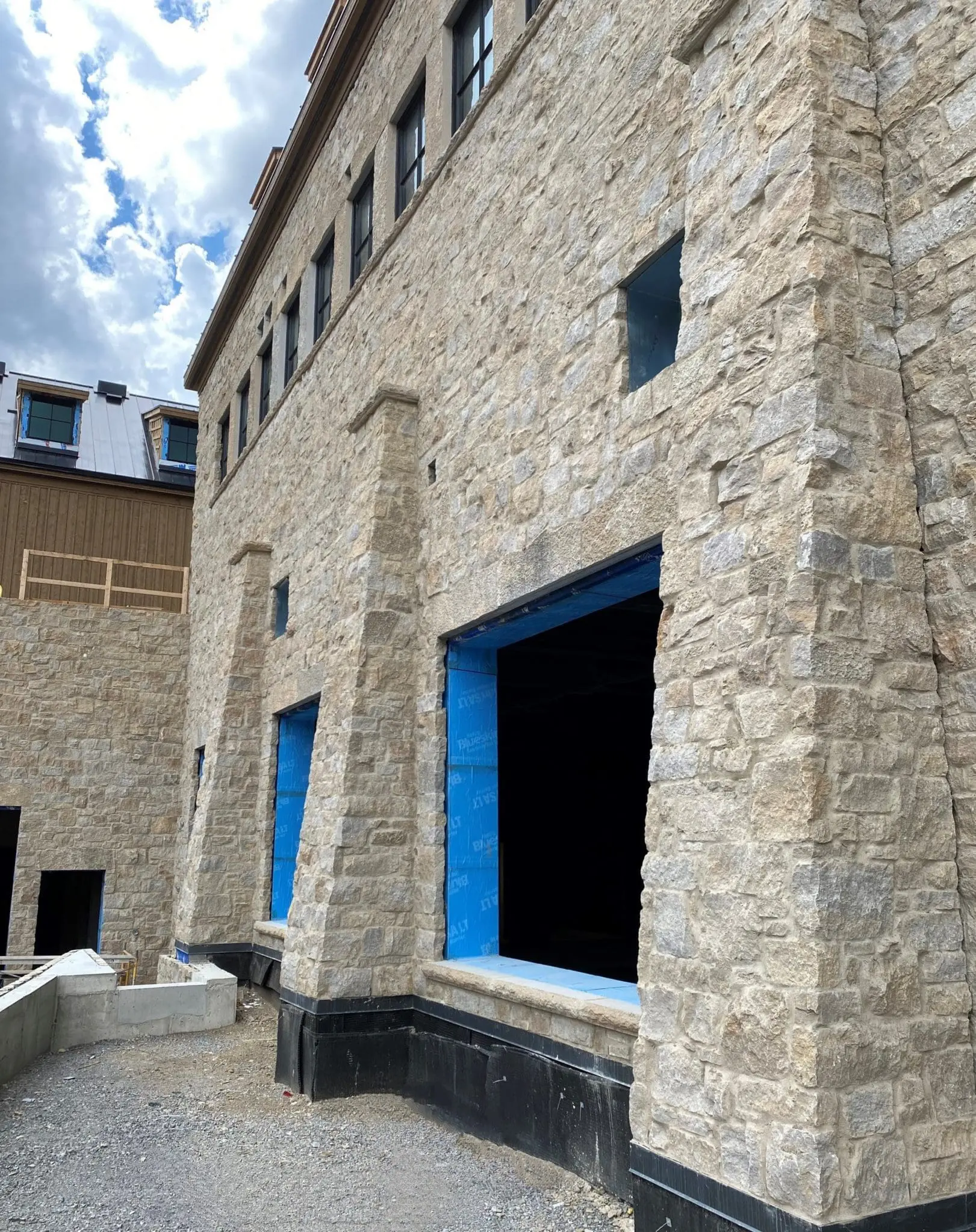 Tuscan Antique Natural Thin Stone Veneer Exterior in Progress