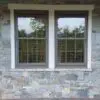 Augusta and Bayside Custom Blend Natural Stone Veneer Covered Patio