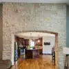 Draper Natural Thin Stone Veneer with Gold Kitchen