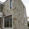 Colonial and Chateau with Large Pieces Natural Stone Veneer Exterior