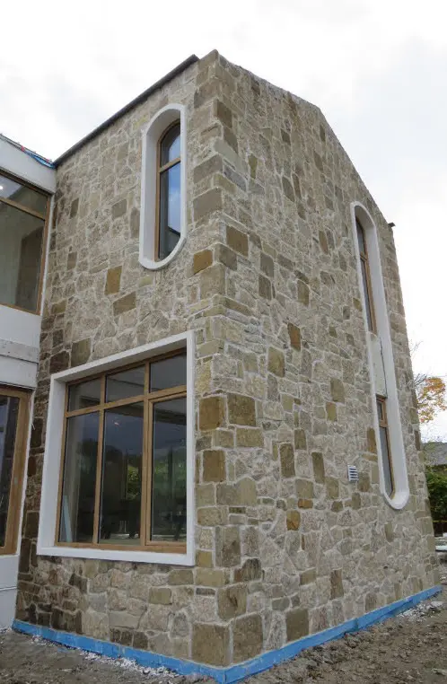 Colonial and Chateau with Large Pieces Natural Stone Veneer Exterior