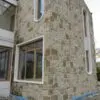 Colonial and Chateau with Large Pieces Real Stone Veneer Exterior