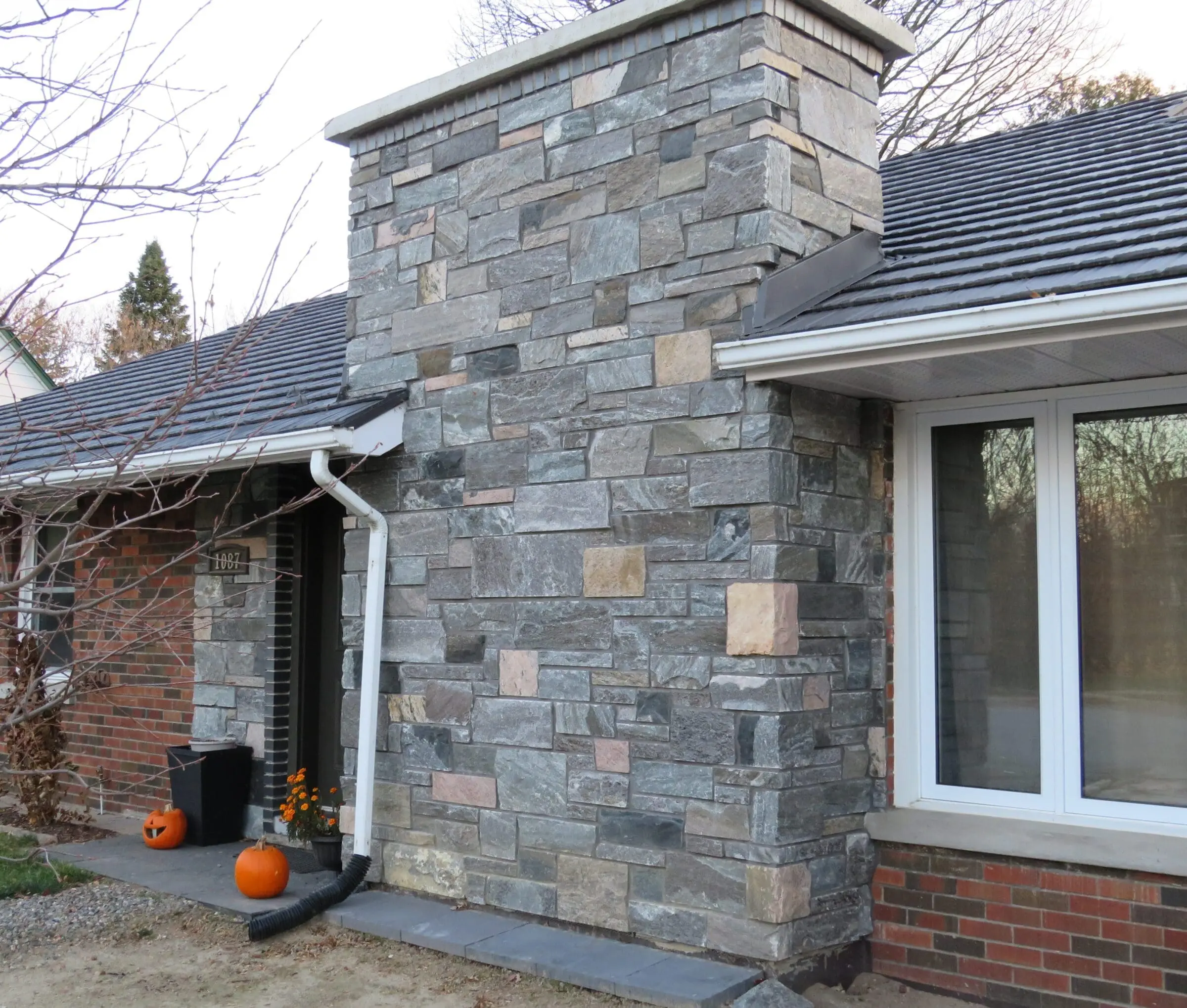 Custom Astoria Real Stone Veneer with Sawn Heights Exterior and Custom Color (Less Pink)