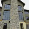 Larchmont and Castle Ridge Natural Stone Veneer Chimney Installation