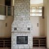 Custom Coastal Mist Fireplace with colored stone removed